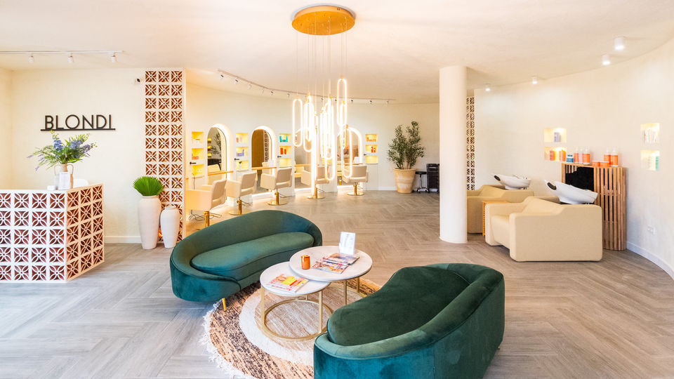 Reception, styling chairs and seating inside BLONDI Sotogrande
