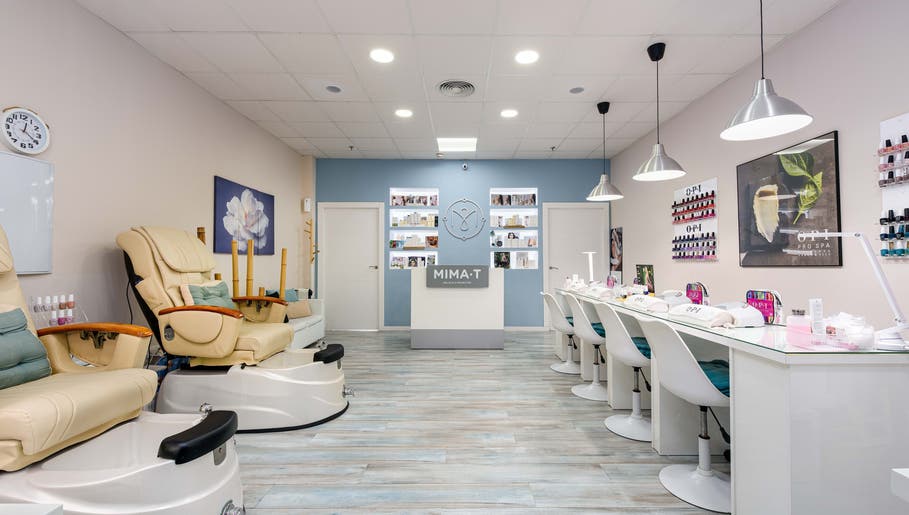 Pedicure chairs and manicure stations inside Mima-T Sotogrande
